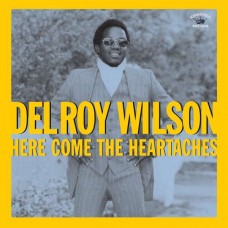 DELROY WILSON-HERE COMES THE HEARTACHES (LP)